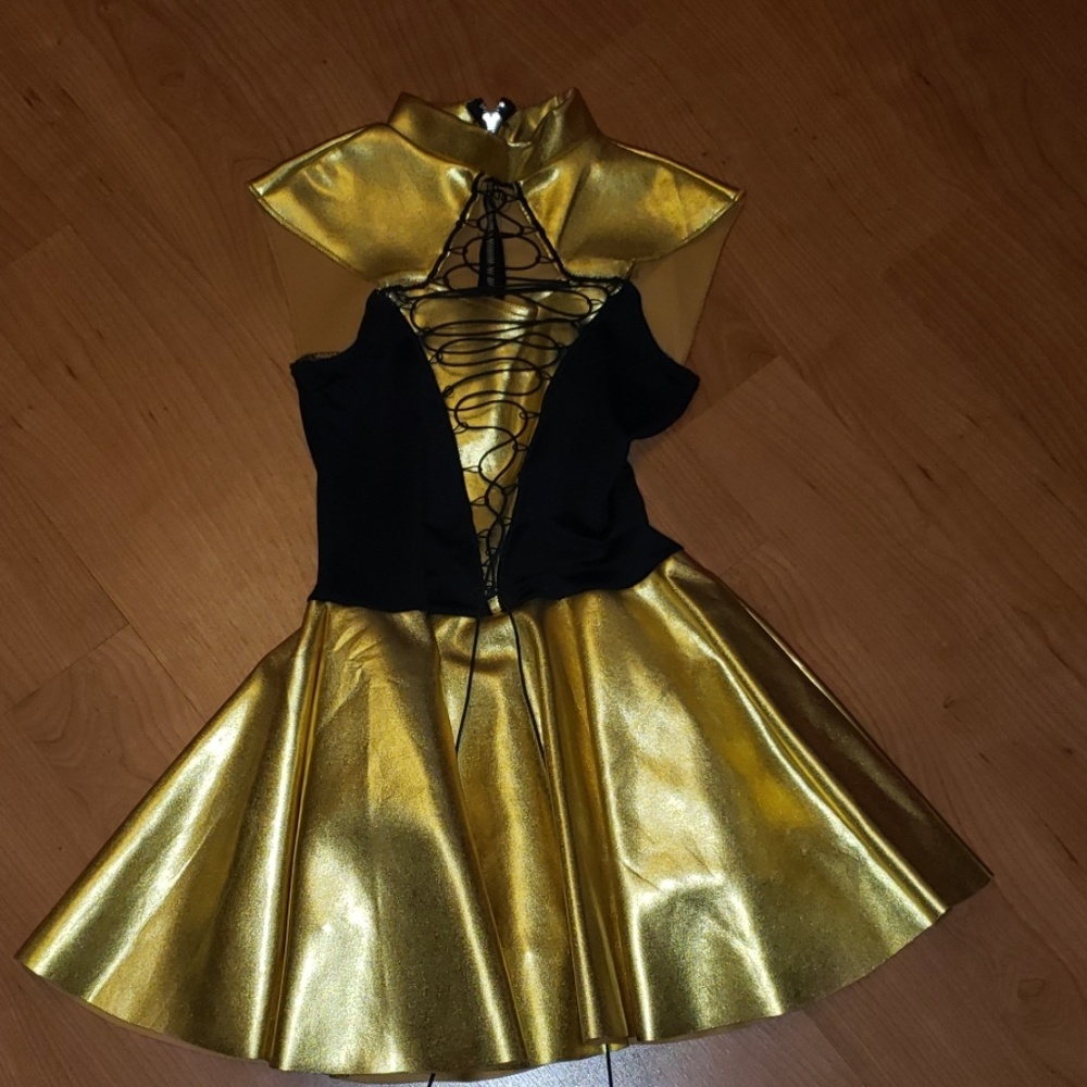 Gold dance costume only twice